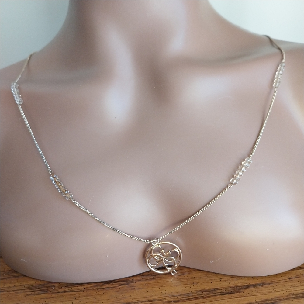 Guess Gold and Crystal Pendant Necklace - Picture 4 of 13
